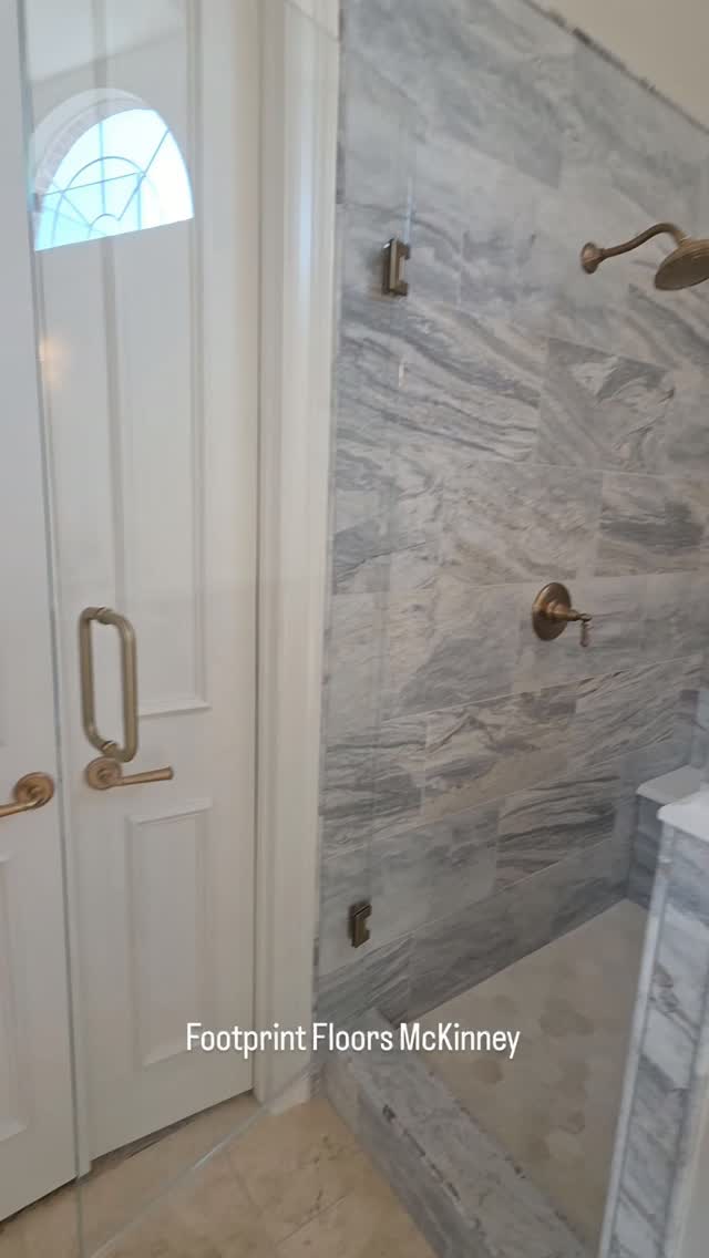 Another beautiful master bathroom, remodeled with marble and mosaic, low iron glass, new paint, and countertops, with a lifetime schluter warranty