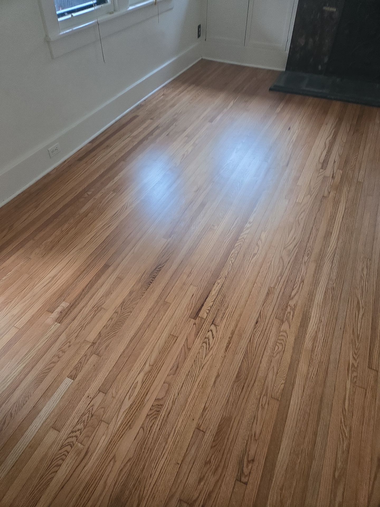 Before &rarr; After ✨ Worn, pet-stained hardwood floors across multiple rooms &mdash; repaired, laced in, sanded, and refinished with a commercial water-based finish. The grain is back, the joints are tight, and the shoe molding ties it all together. This is what a full hardwood restoration looks like. Ask us about your floors!