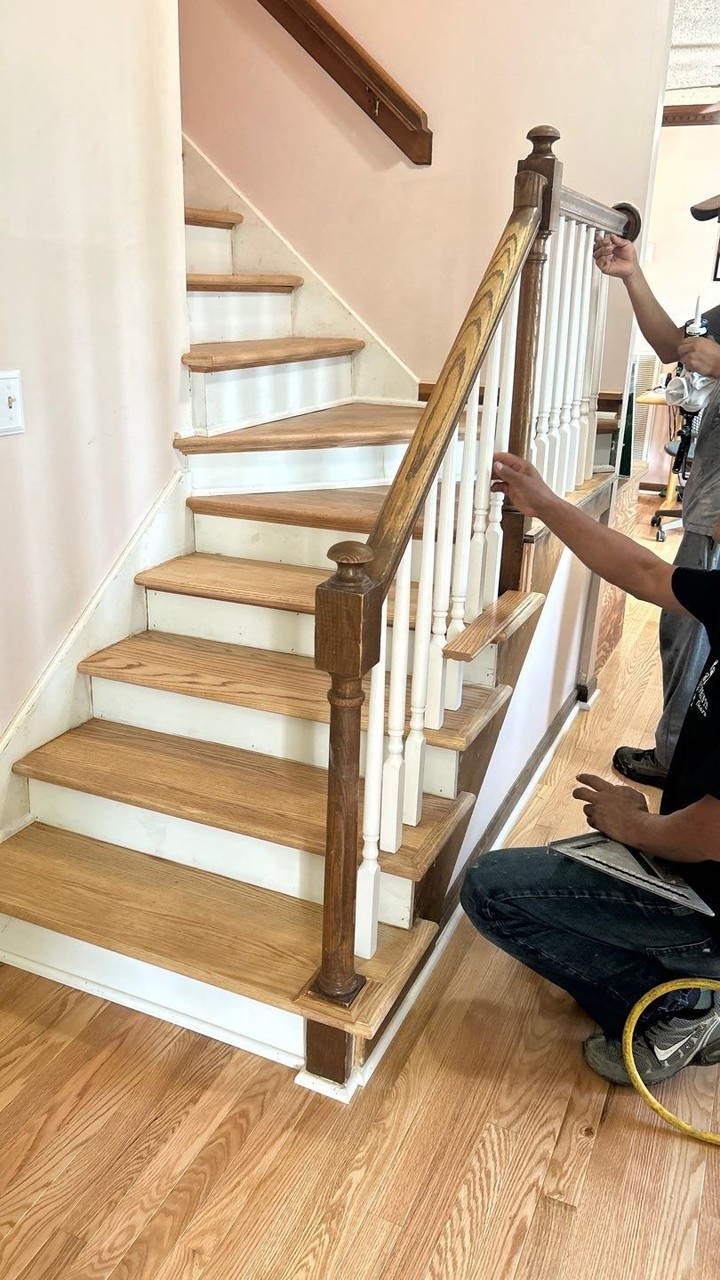 Carpet out. Hardwood in. ✨ From demo day to finished stair treads, this whole-home install was a full transformation &mdash; new pre-finished oak throughout the home and fresh hardwood treads on the staircase with baluster and handrail work to match. The before photos don't lie. Ask us about your floors! 👇