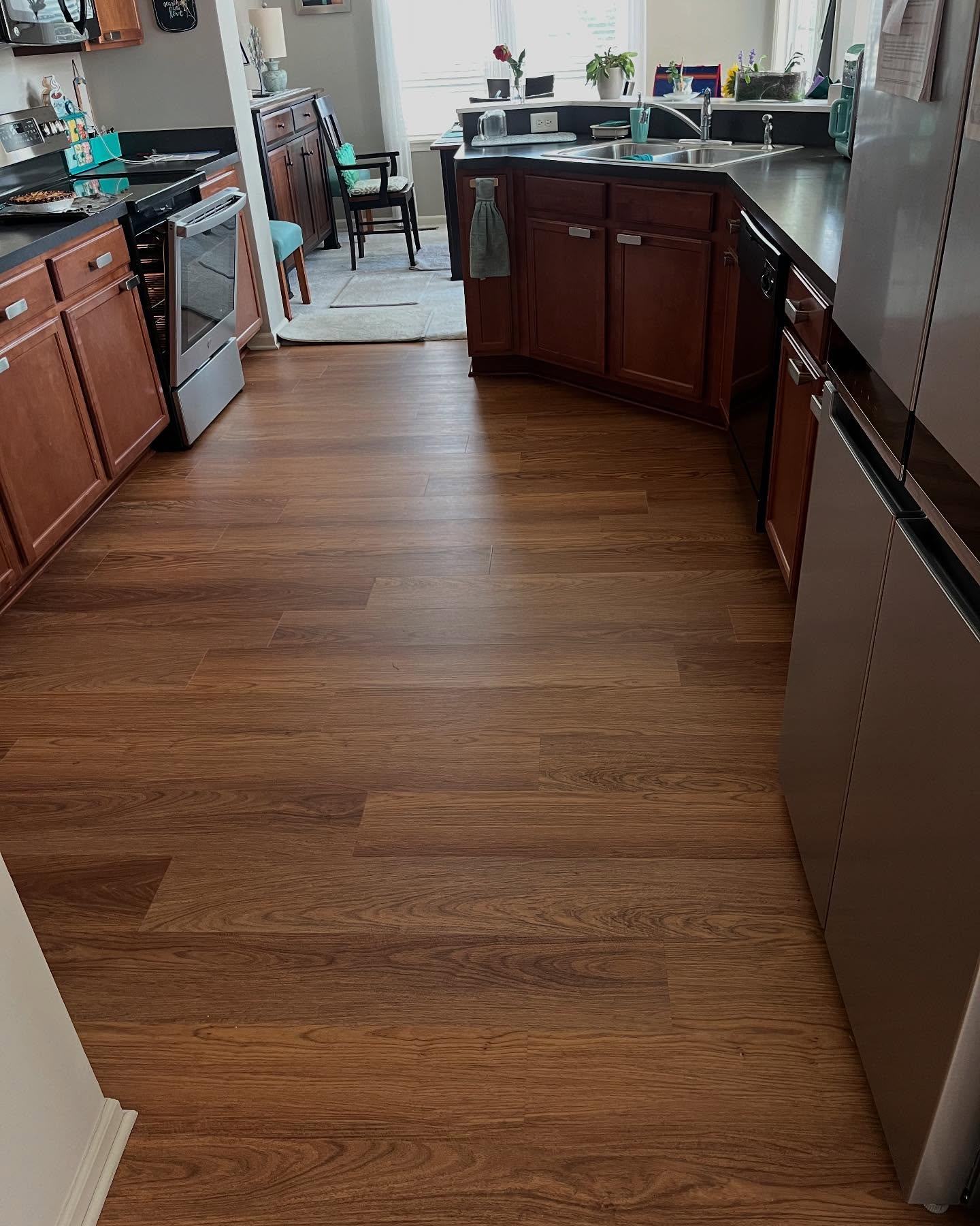 Say goodbye to outdated floors and hello to a sleek new look! LVP is the perfect mix of beauty and durability. What do you think of this install?
