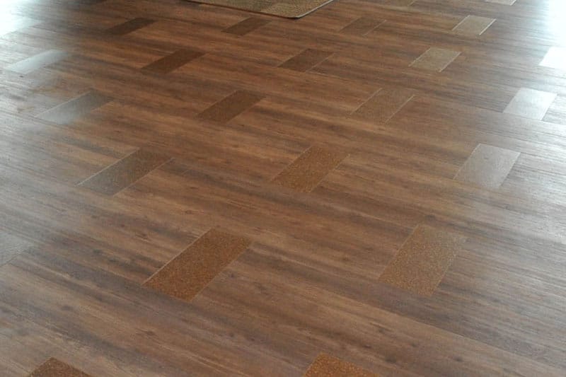 An image of brown laminate flooring.