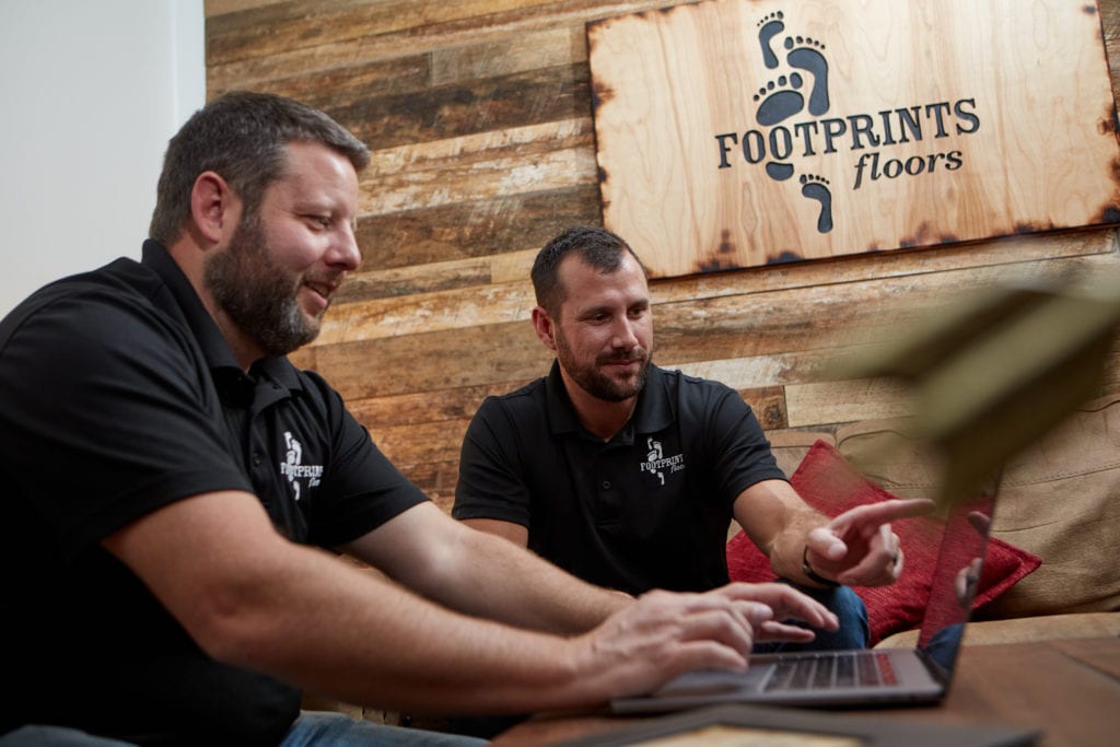 An image of a Footprints Floors owner speaking CEO, Bryan Park.