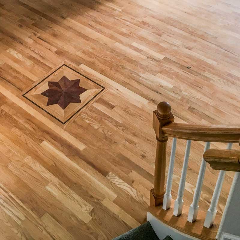 This beautiful and intricate hardwood flooring was installed by Footprints Floors professionals.