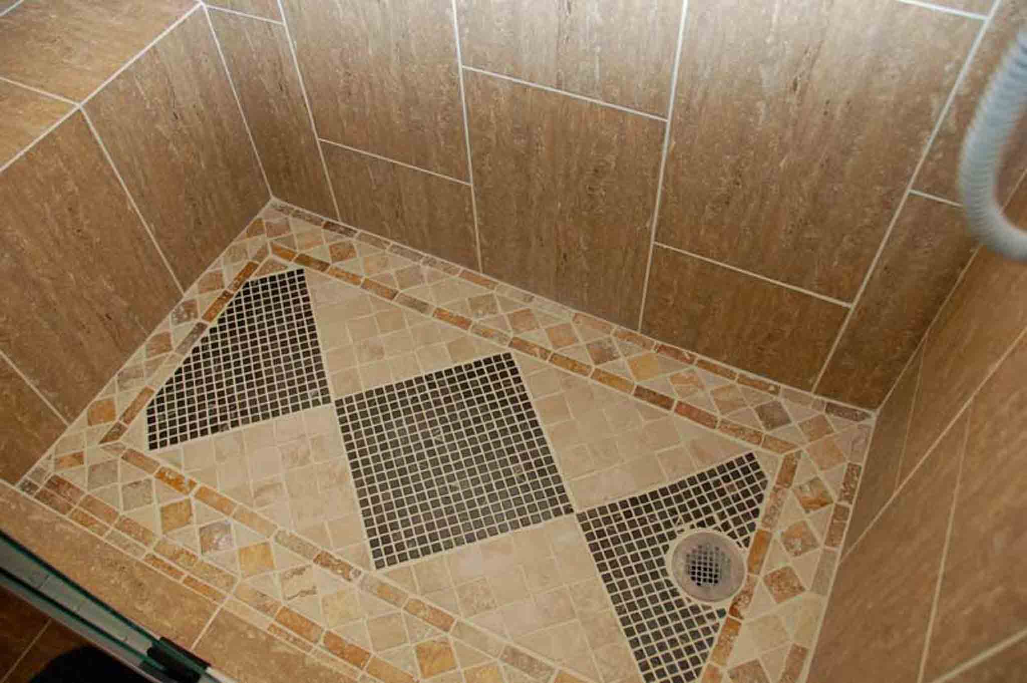 A stand up shower with brown tile, done by Footprints Floors of the MidSouth.