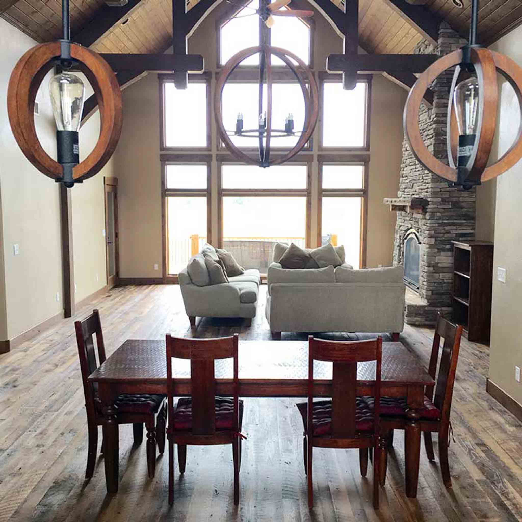 A large living room dark wood flooring by Footprints Floors of the MidSouth.