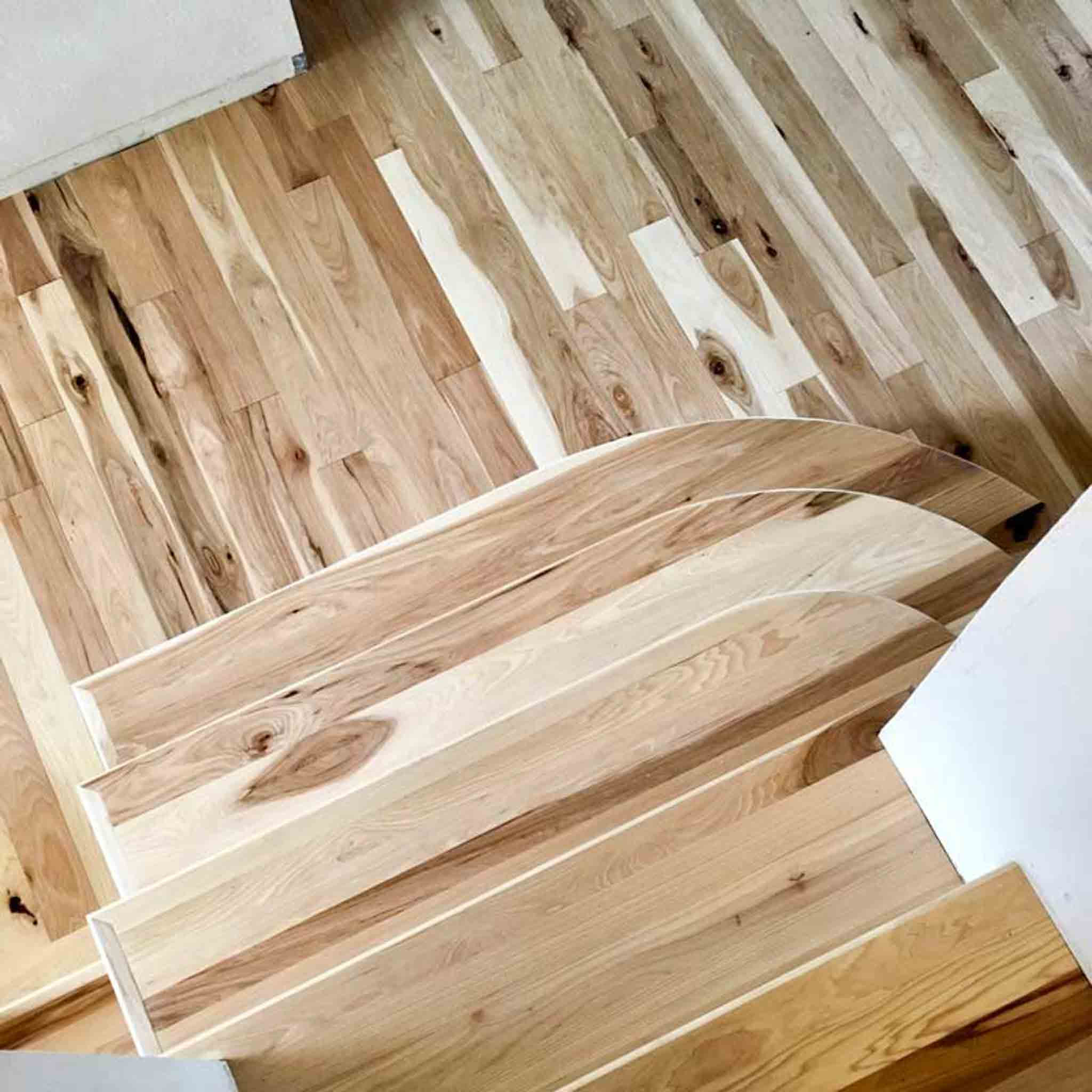 Wood flooring with dark and light patterns, done by Footprints Floors of the MidSouth.