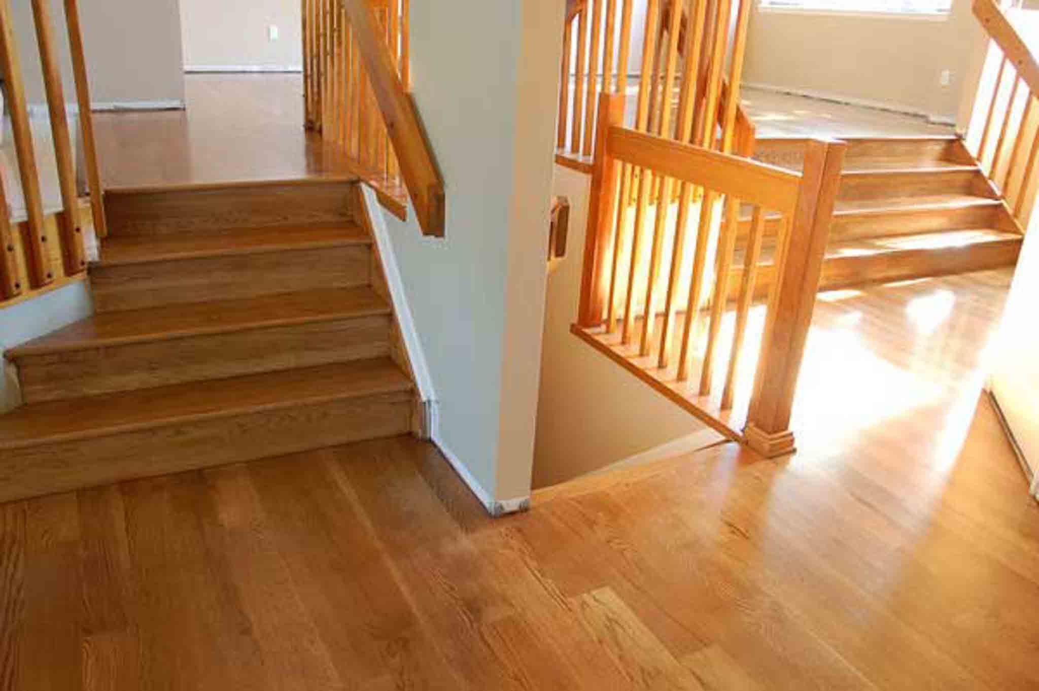 Light brown stairs, wood installed by Footprints Floors of the MidSouth.