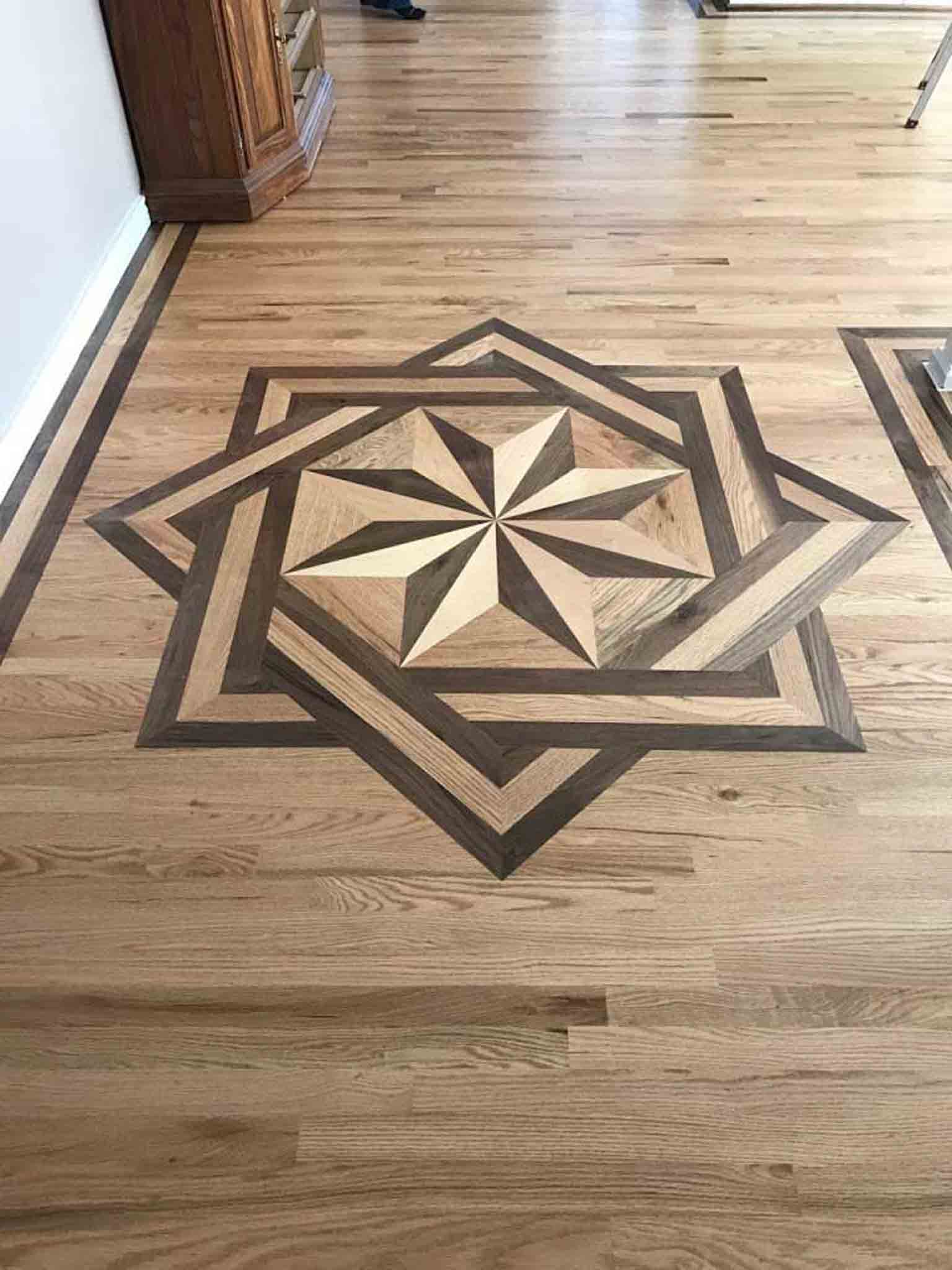 A star design in laminate flooring, installed by Footprints Floors of the MidSouth.