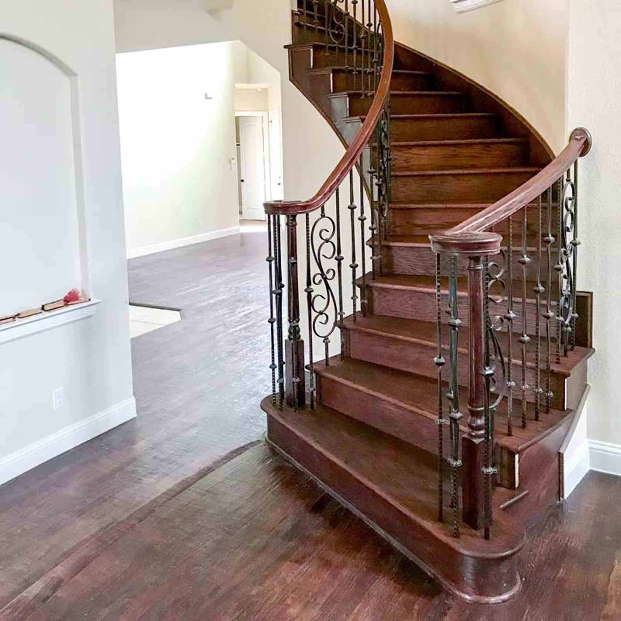 Dark wooden stairs, installed by Footprints Floors of the MidSouth.