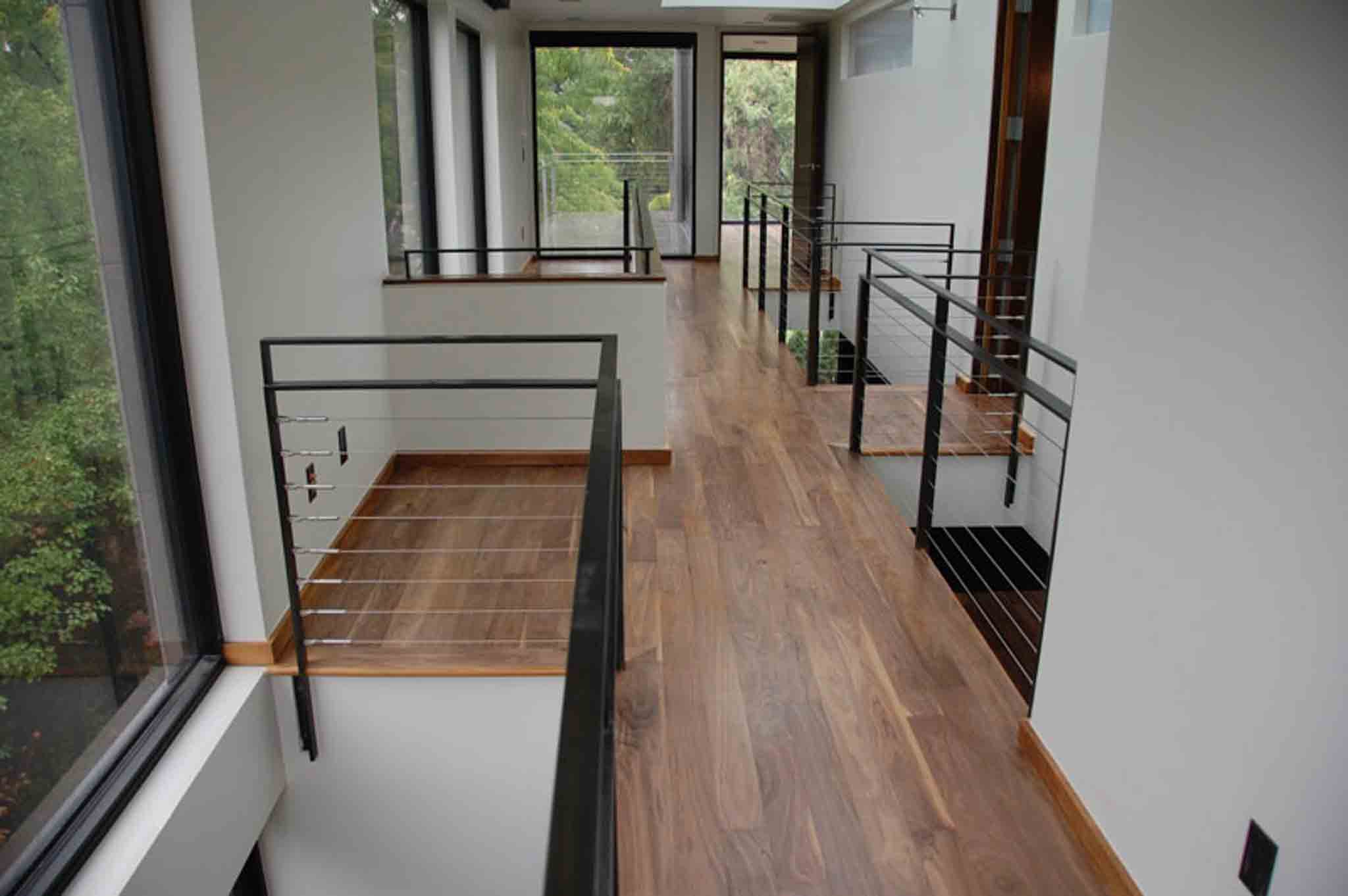 Modern laminate stairs, installed by Footprints Floors of the MidSouth.