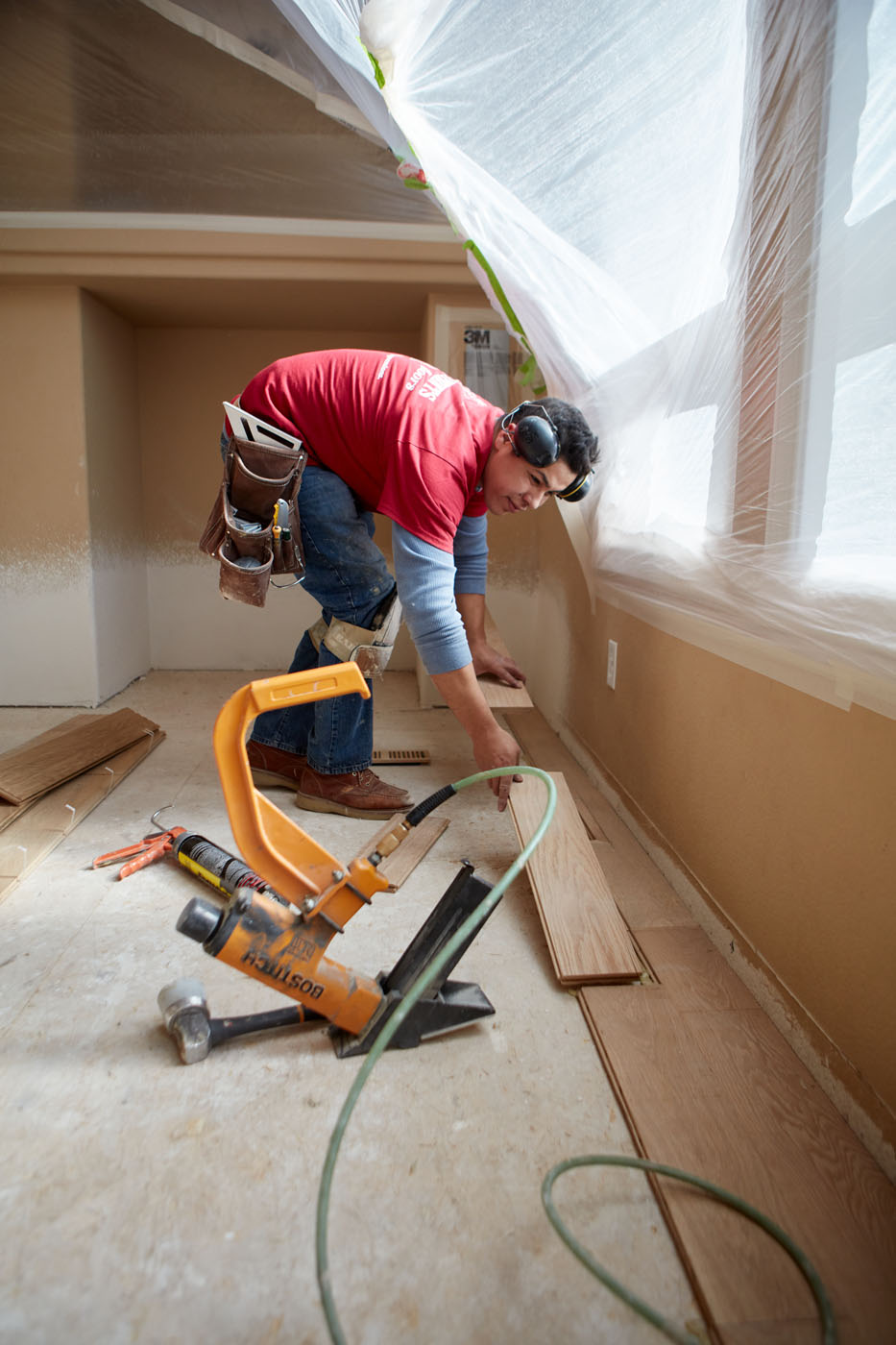 An image of a Footprints Floors expert installing floors - find inspiriation for your project by checking out our flooring installation gallery in Miami / Broward, FL.