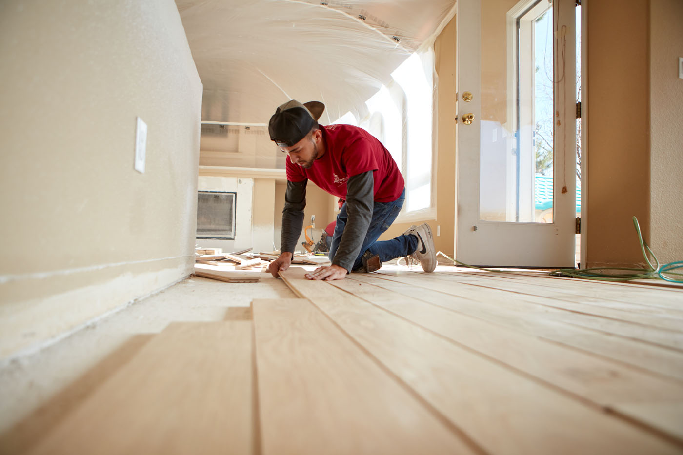 A Footprints Floors worker completing a flooring project for a residential property.