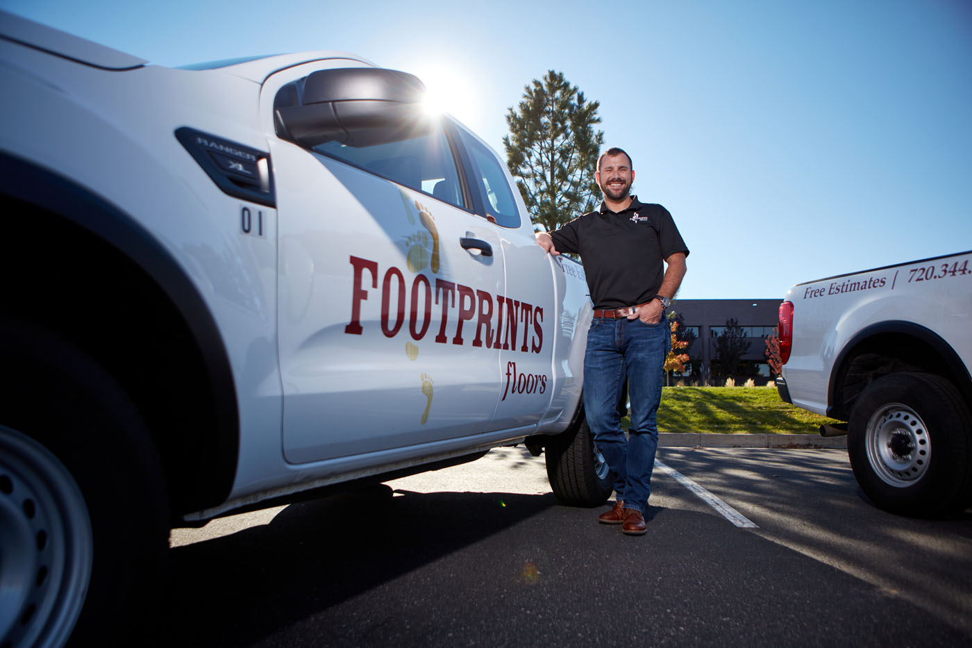 A Footprints Floors team member with our service vehicle.