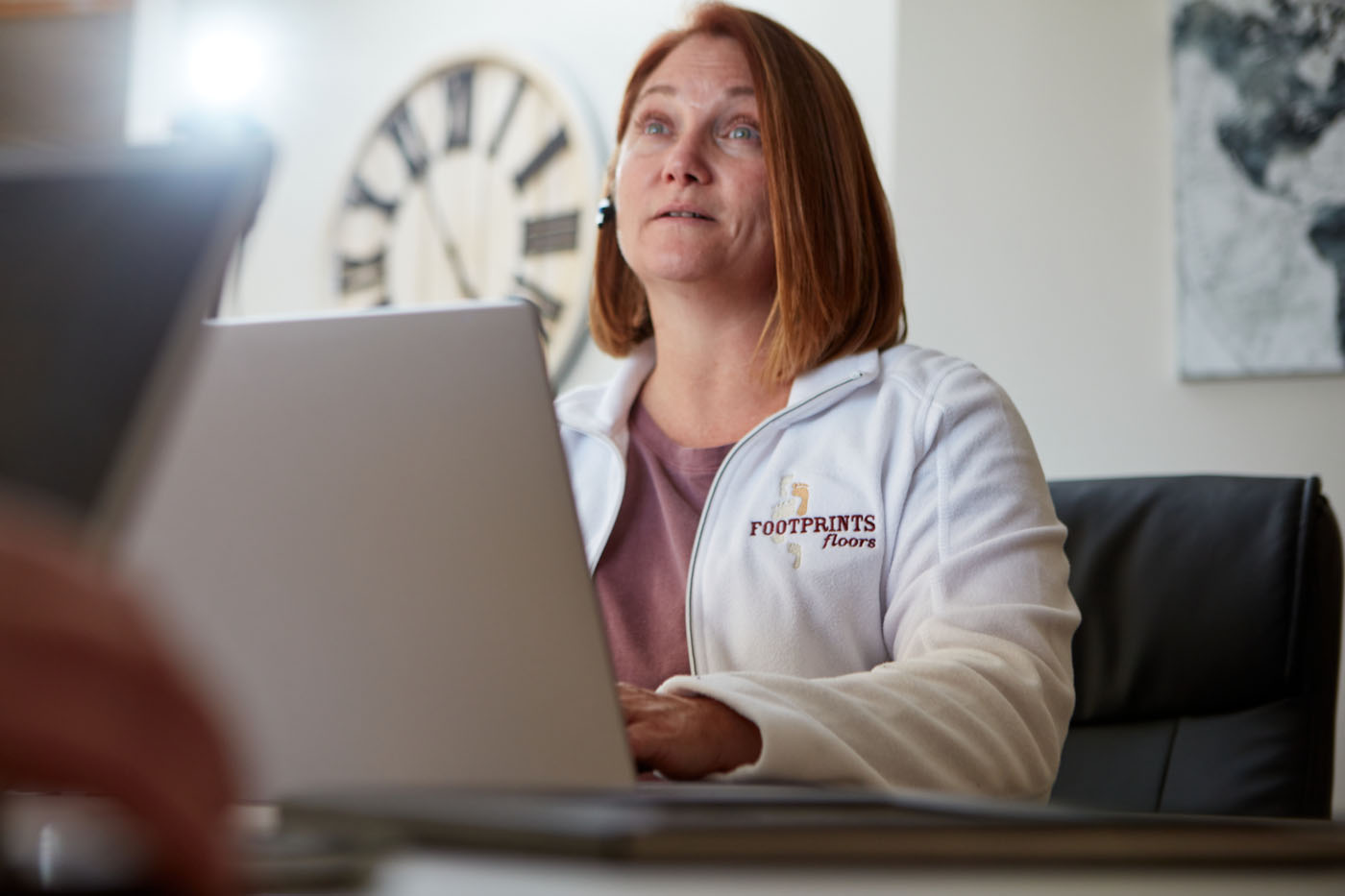 A Footprints Floors corproate team member - learn how starting a flooring business is made simple with our team.
