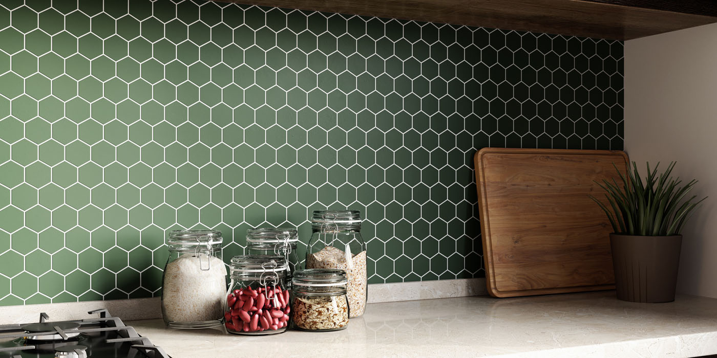 A kitchen with a ceramic tile backsplash.