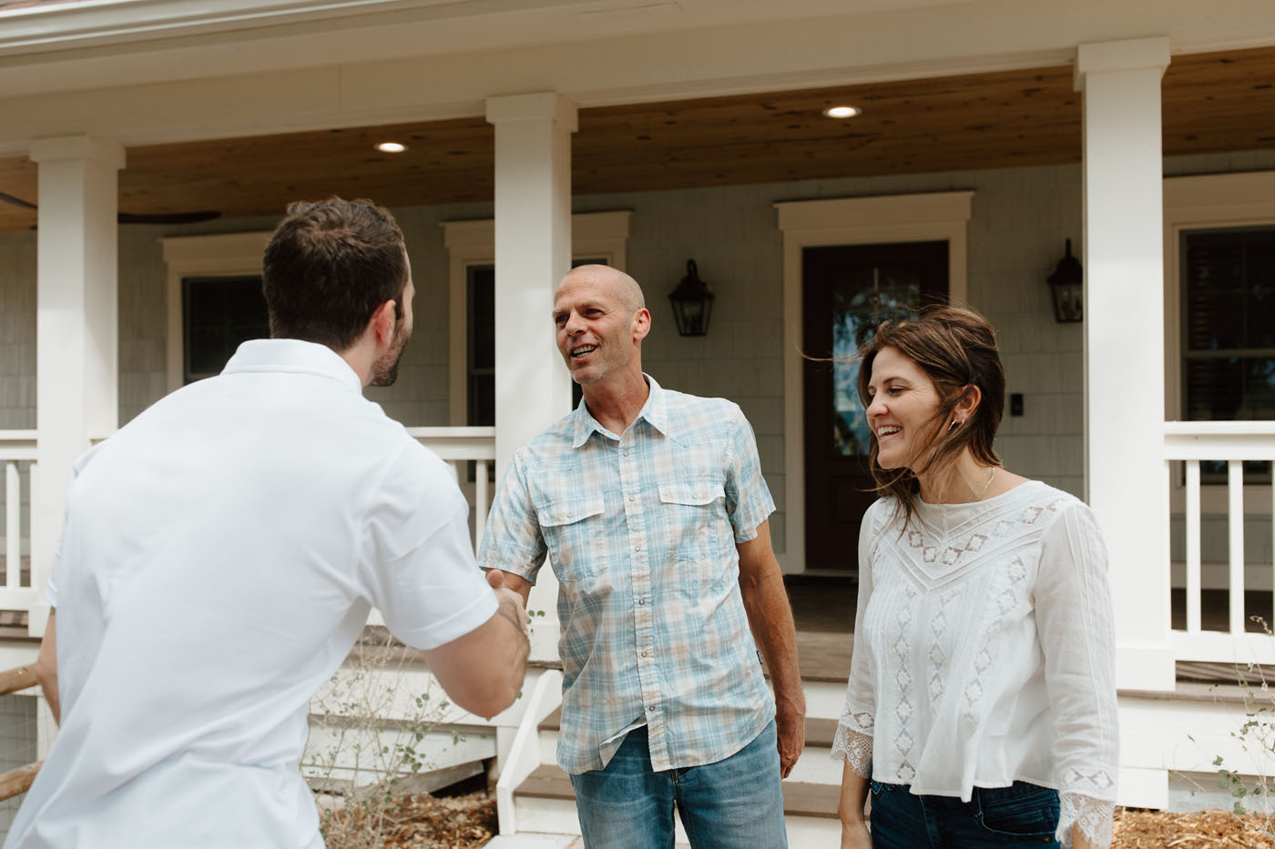 A Footprints Floors expert helping a customer decide on their flooring.