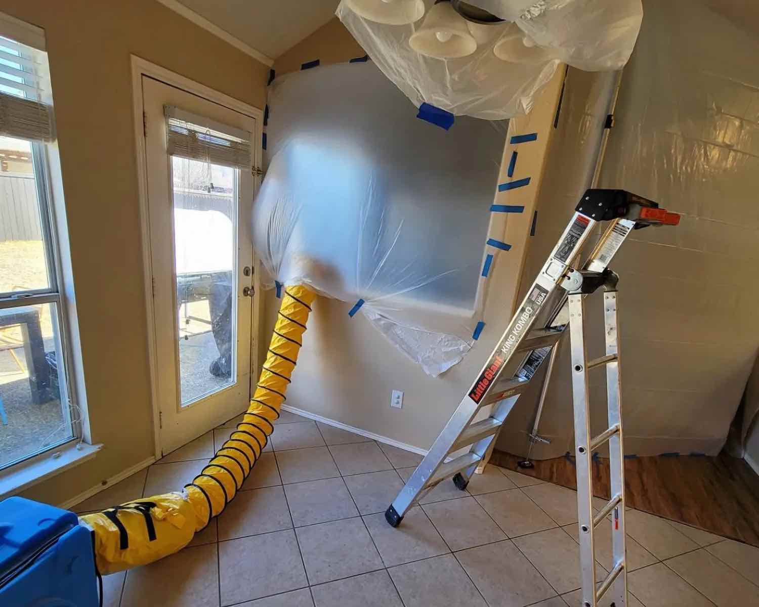 A hallway covered by plastic for dustless demo services in McKinney / Plano, TX.