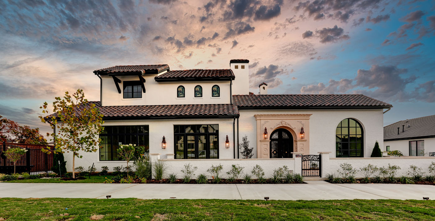 A beautiful picutre of the outside of a residential home - learn how floors can increase your home value with these articles from Footprints Floors.