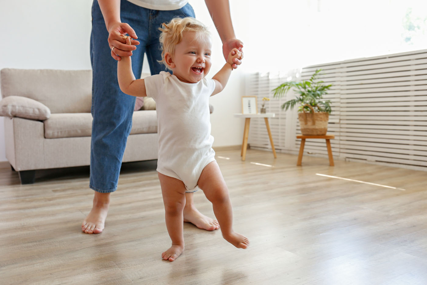 A picture of two children playing on the vinyl flooring - Footprints Floors.