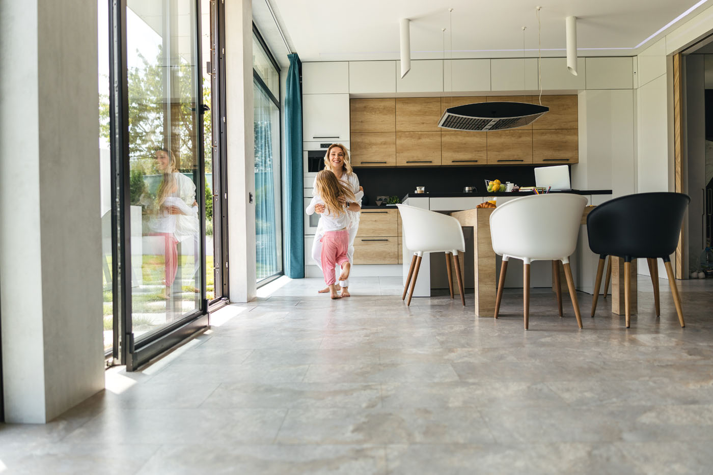 A beautiful kitchen with smooth tile - for tile replacement in Reno-Sparks Metro, NV contact Footprints Floors.