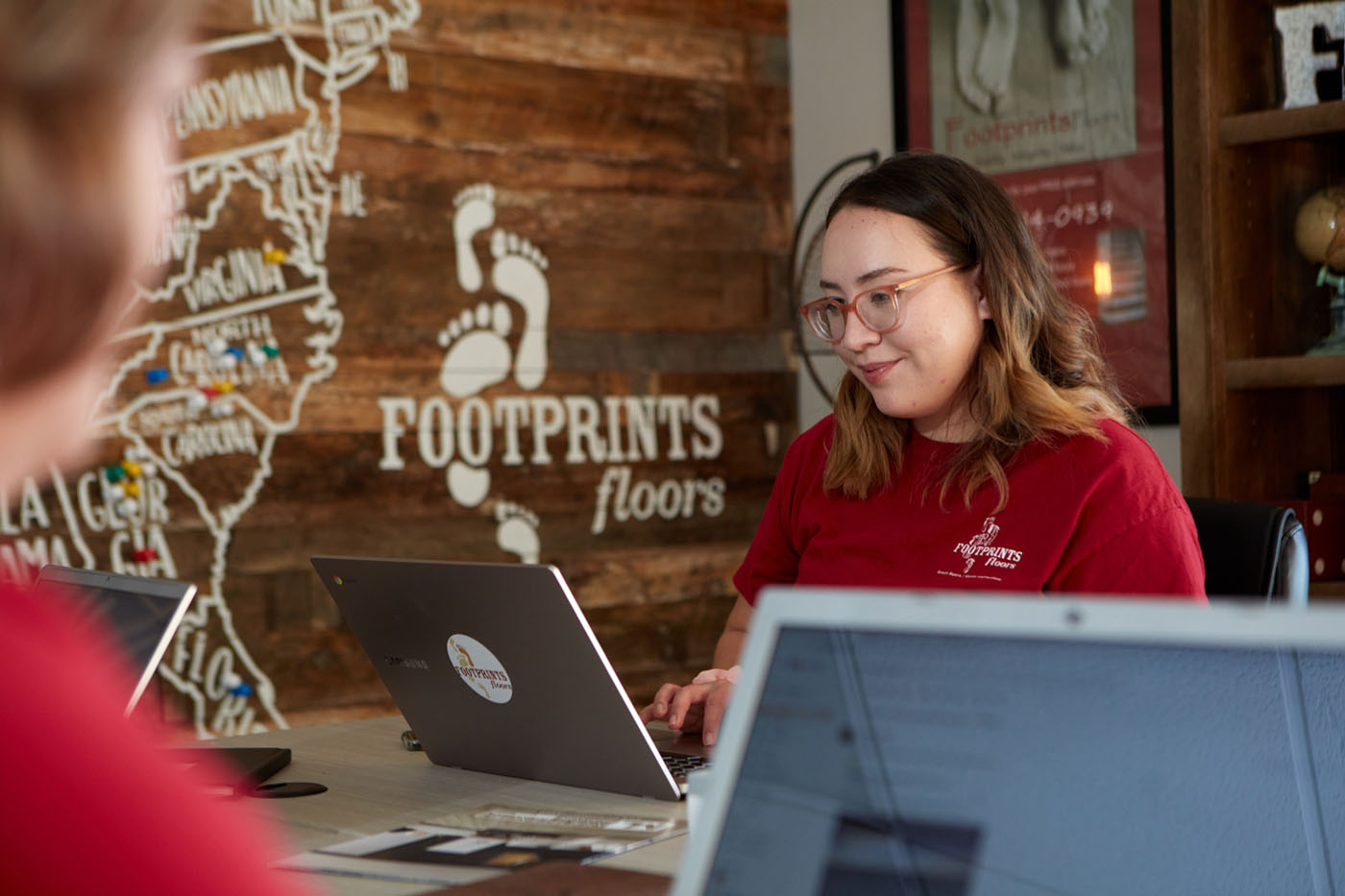 A Footprints Floors service team member - learn how much you can make with our low-cost franchise opportunity.