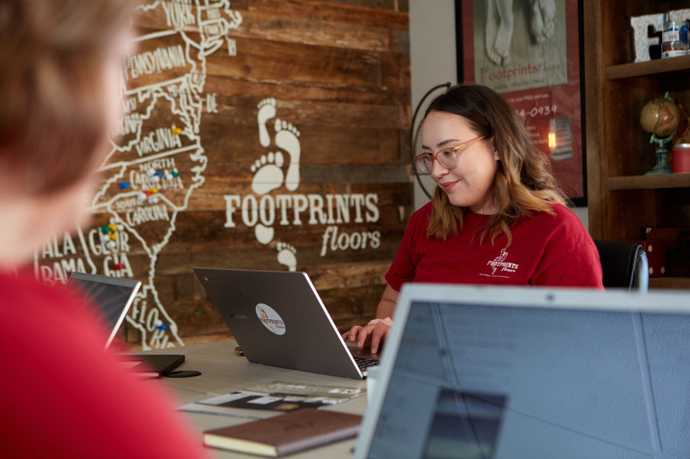 A Footprints Floors professional doing an in-home consultation for flooring services in Arlington / Collierville, TN.