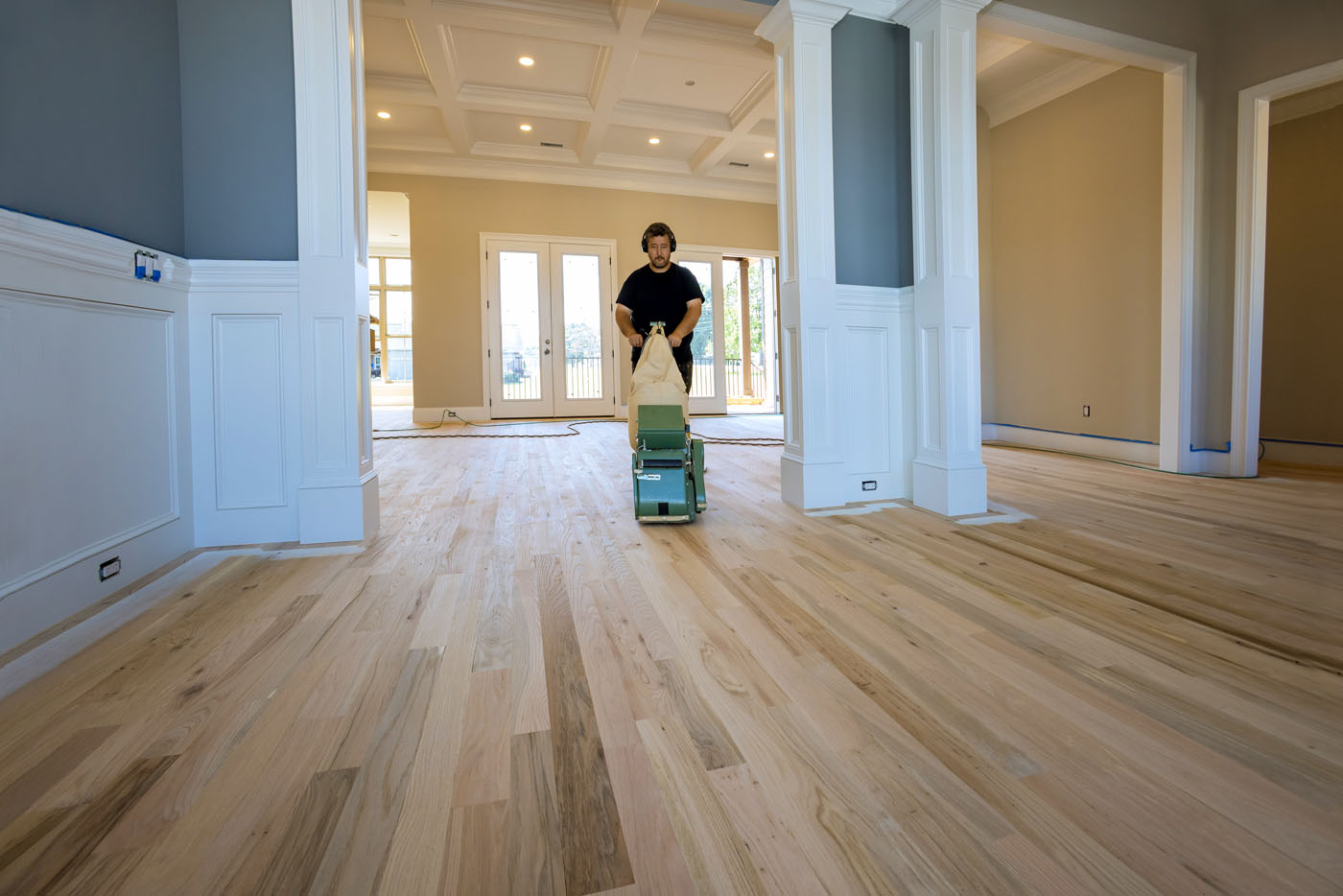 One of the expert Reno-Sparks Metro wood refurbishing contractors from Footprints Floors refinishing hardwood floor.