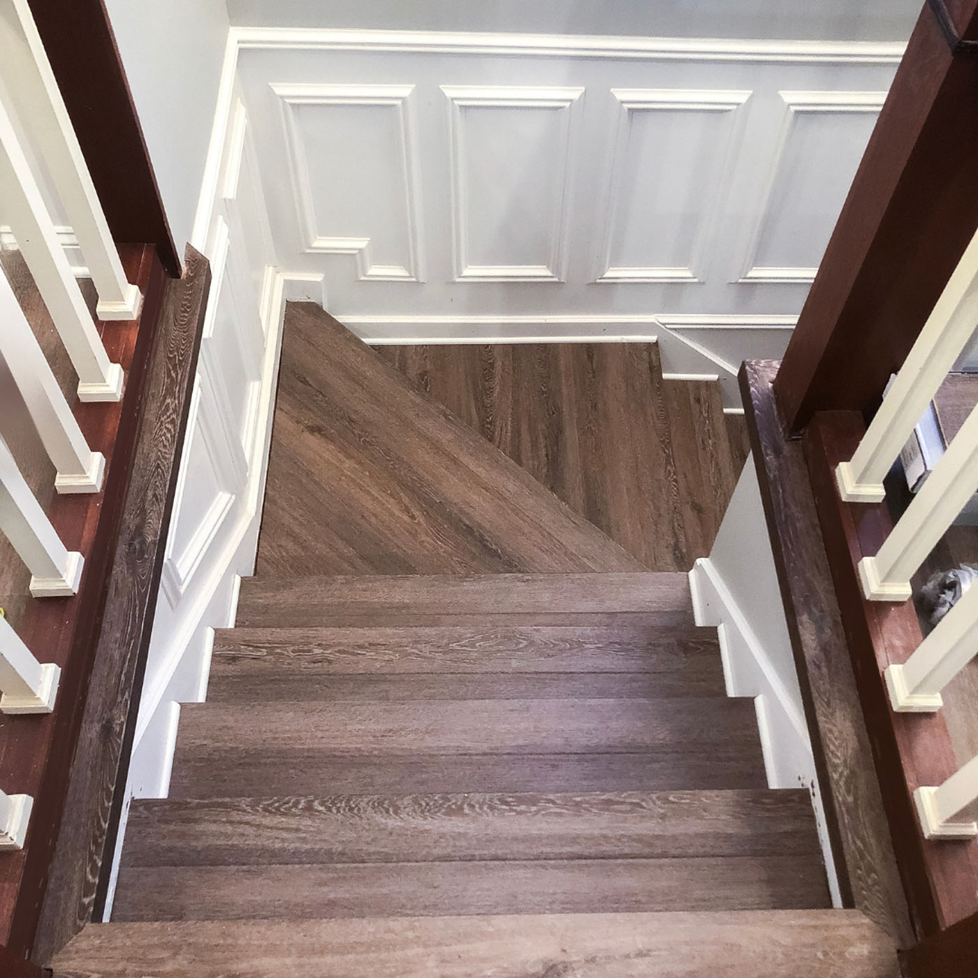 A top-down picture of flooring for stairs in Cincinnati, OH installed by Footprints Floors.