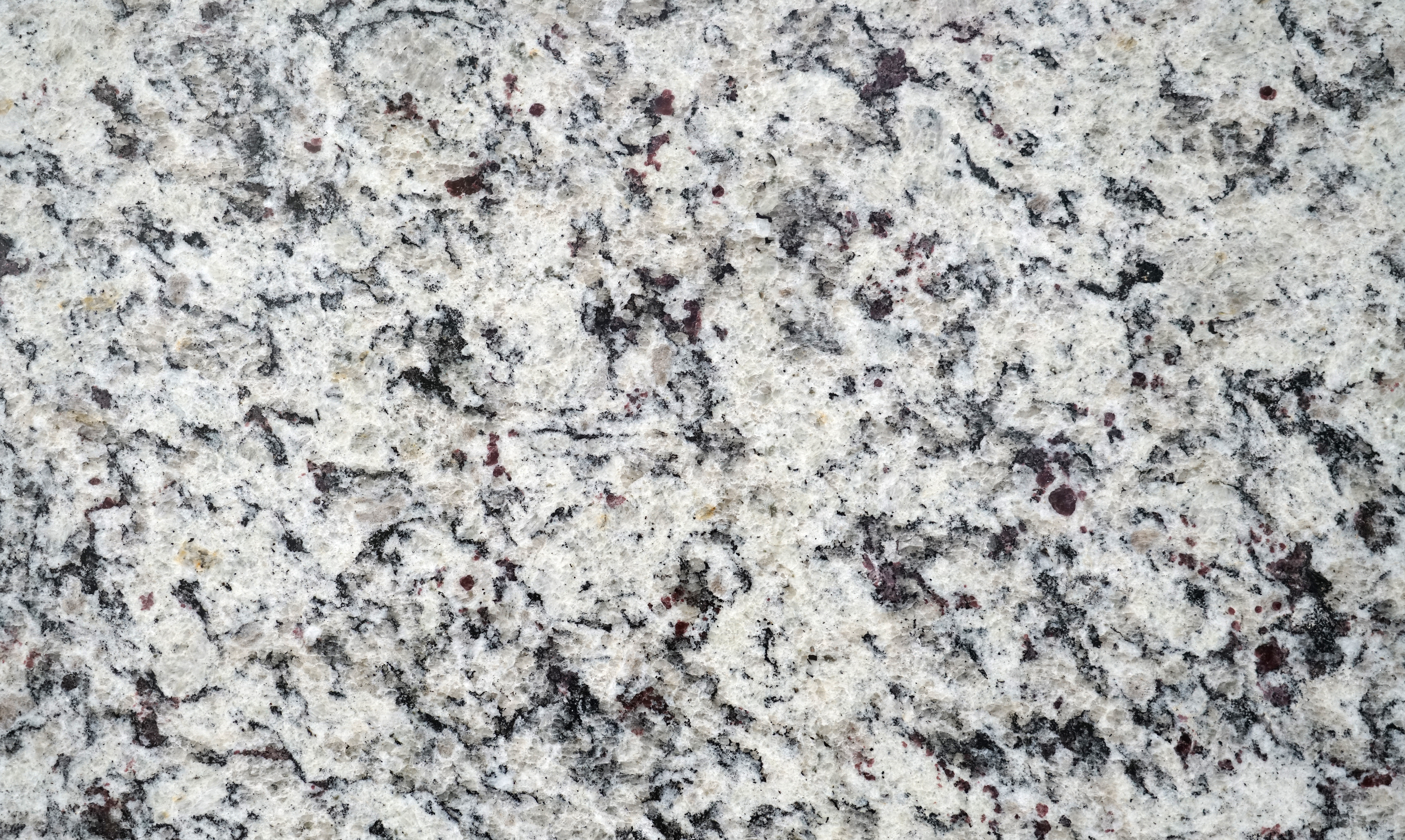 A close up of granite stone flooring.