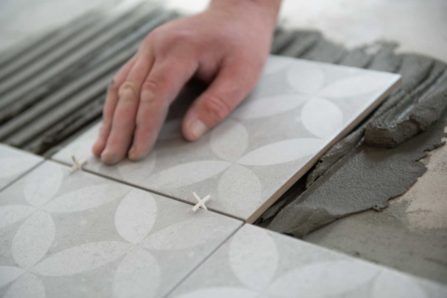 Seal your tile grout lines to keep beautiful tile floors - tips from Footprints Floors in Madison.