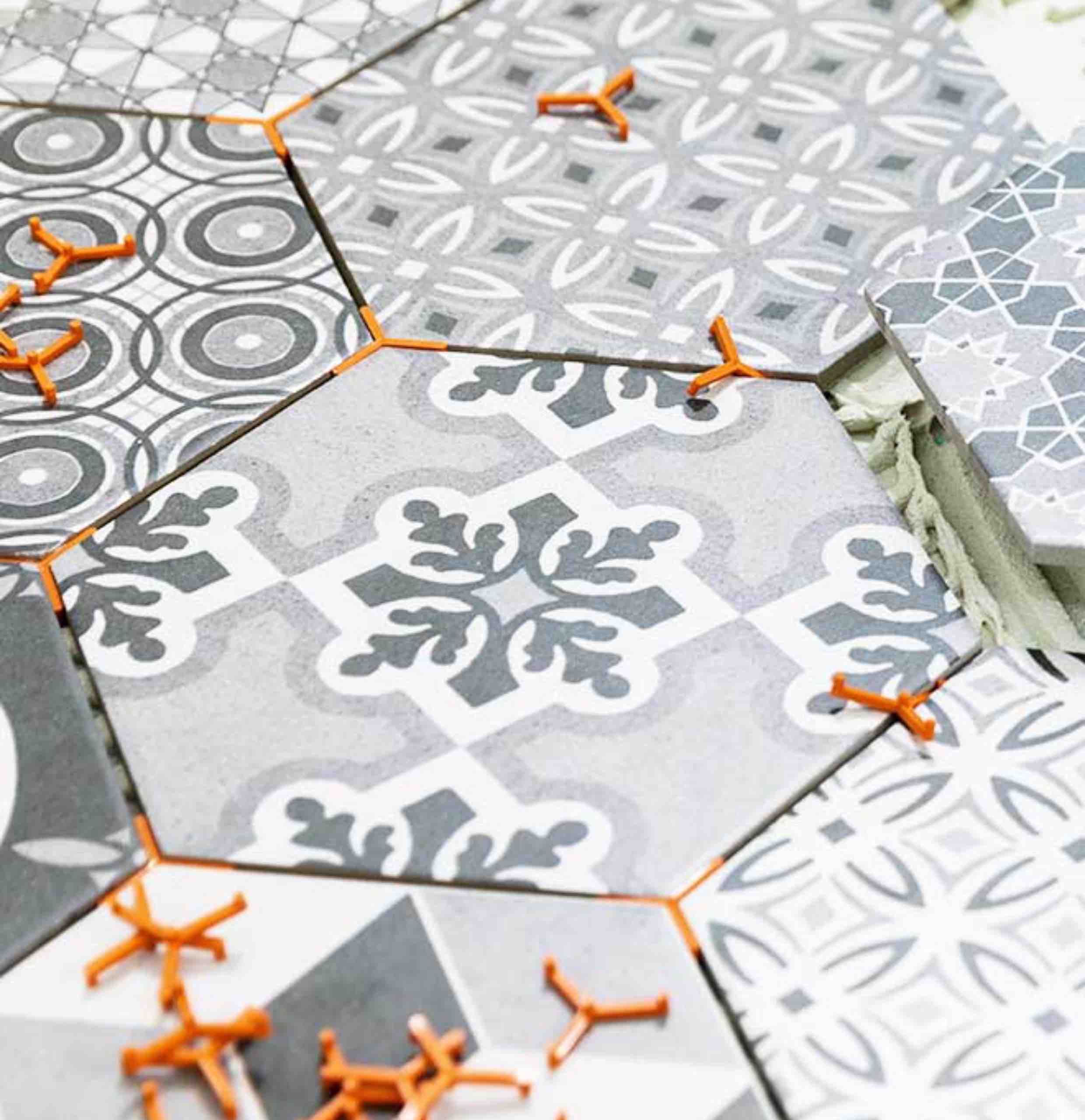Trendy hexagonal tiles installed by Footprints Floors.