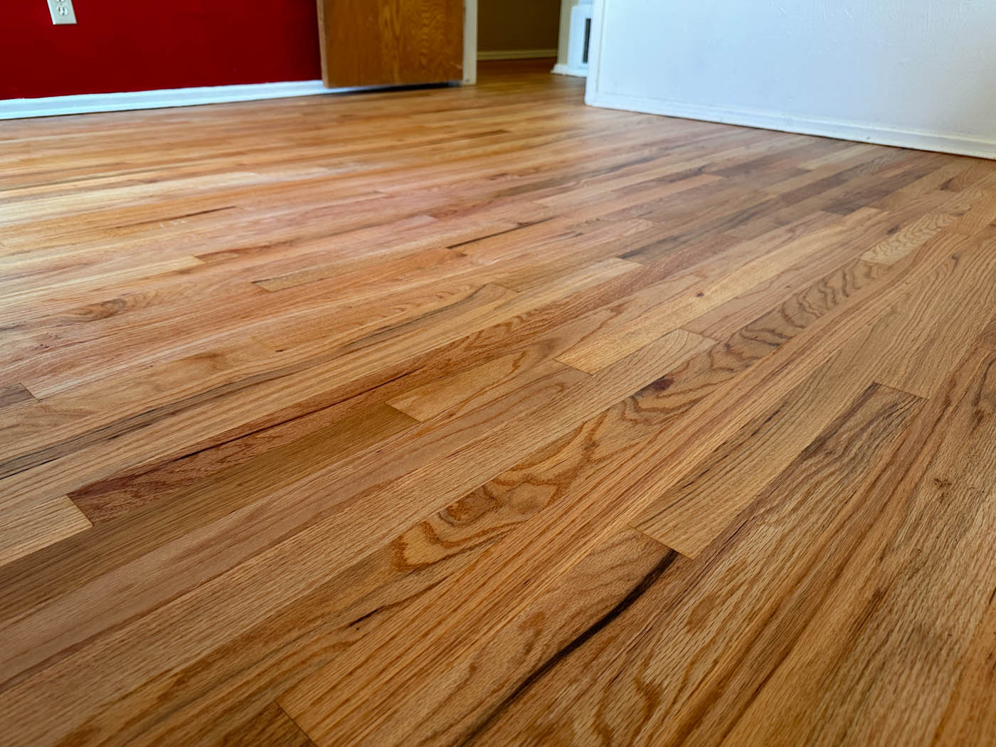 Hardwood LED cure refinishign with Footprints Floors Tri County.